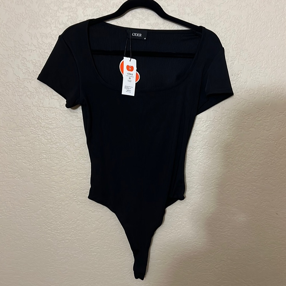 Black bodysuit. Scoopneck tee